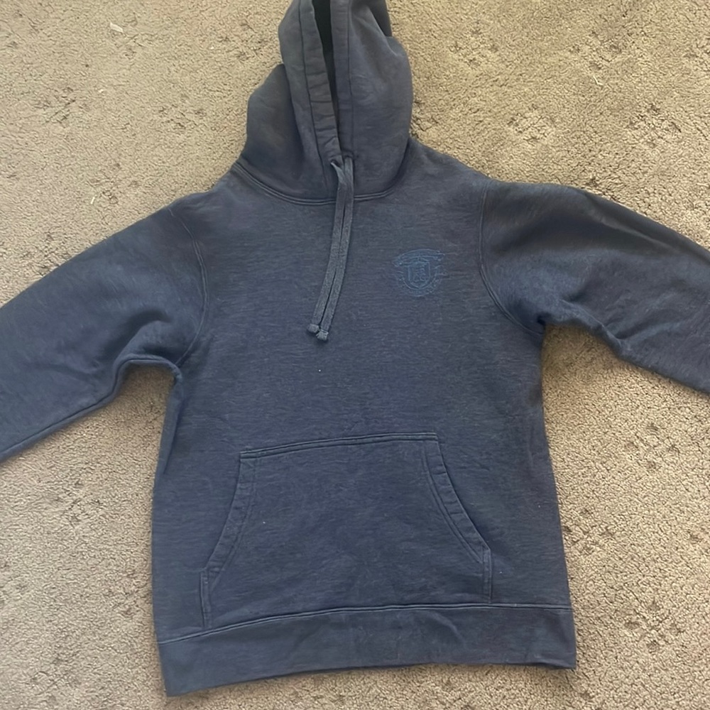 Dark grey hoodie with embroidered cousin beach country club logo on left side
